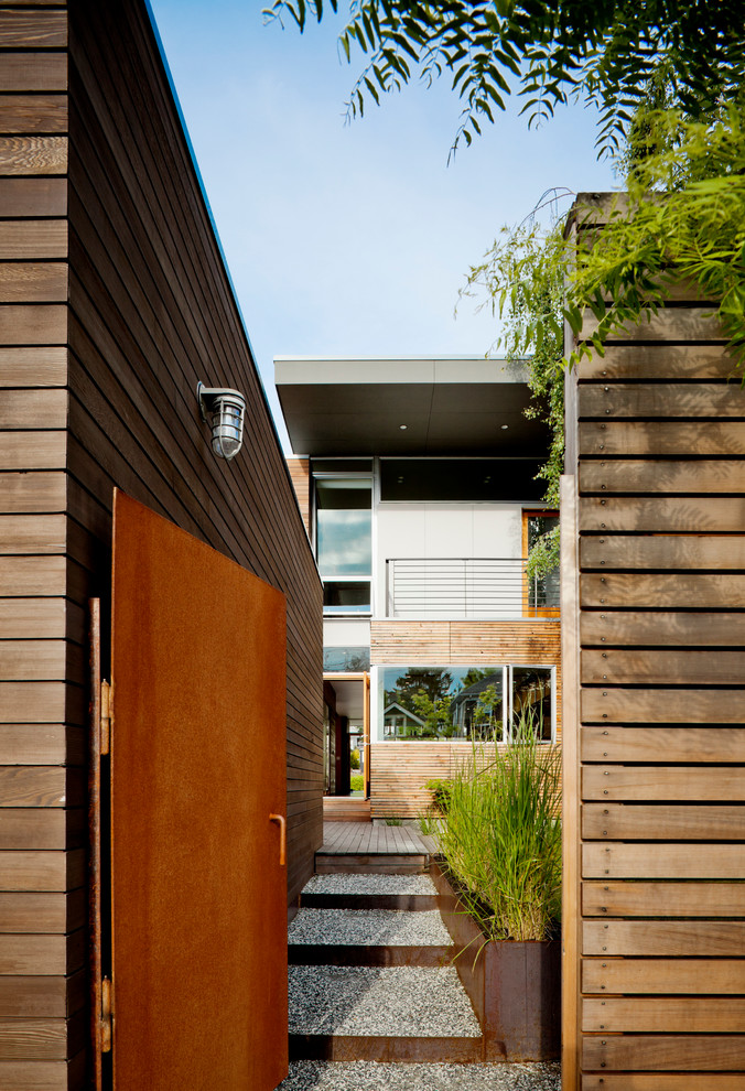 Inspiration for a modern garden in Seattle with a garden path.