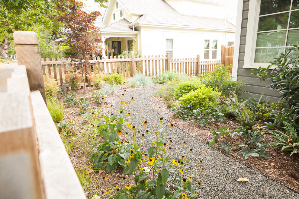 Design ideas for a large transitional partial sun side yard gravel garden path in Other.