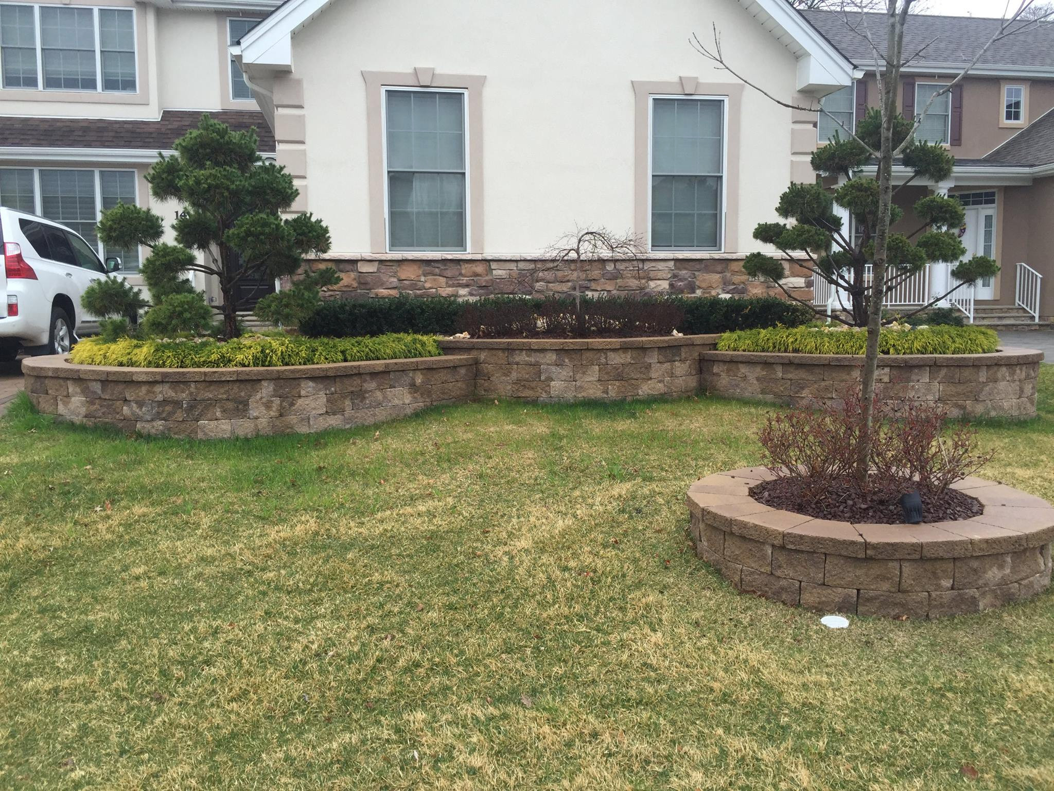 Raised Paver Patio - Outdoor Kitchen, Retaining Walls, Steps, Lighted Piers  - Traditional - Landscape - New York - by Prime Construction & Remodeling  LLC | Houzz