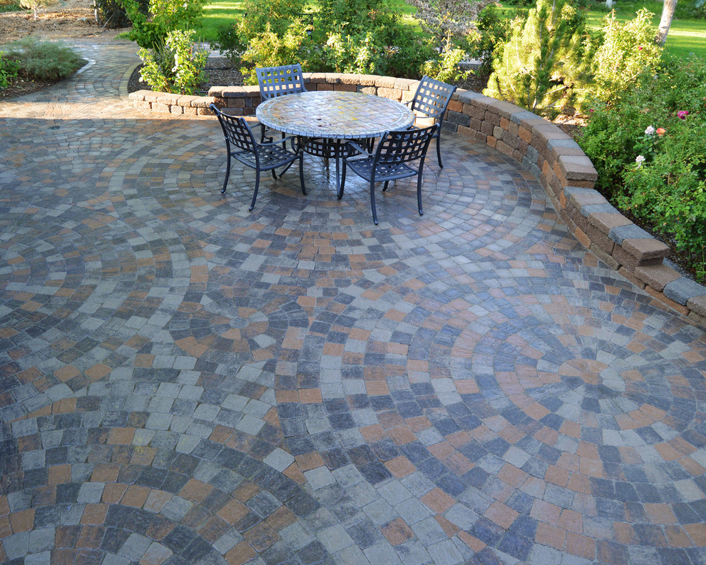Large eclectic backyard concrete paver patio photo in DC Metro