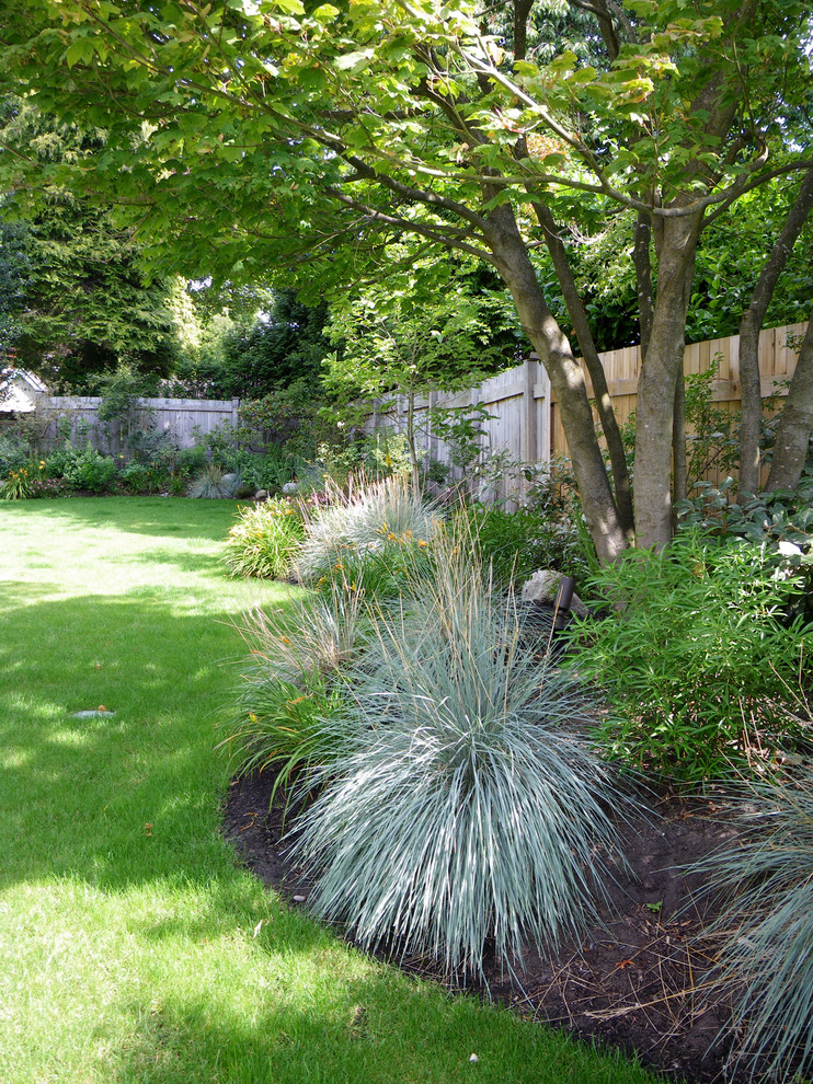 Photo of a contemporary backyard landscaping in Vancouver.