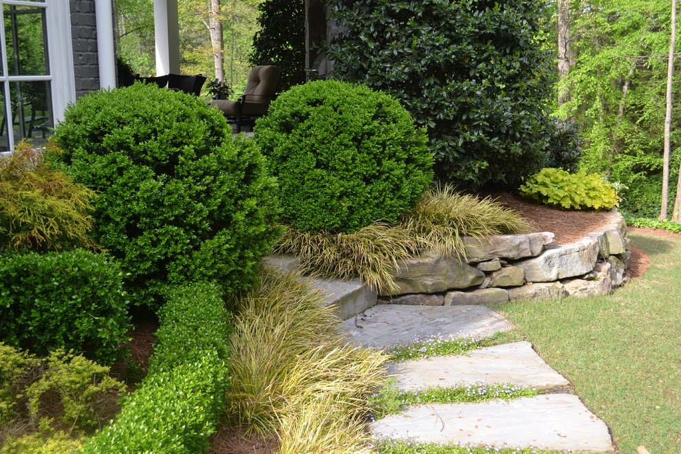 Inspiration for a traditional shade backyard stone landscaping in Atlanta for spring.