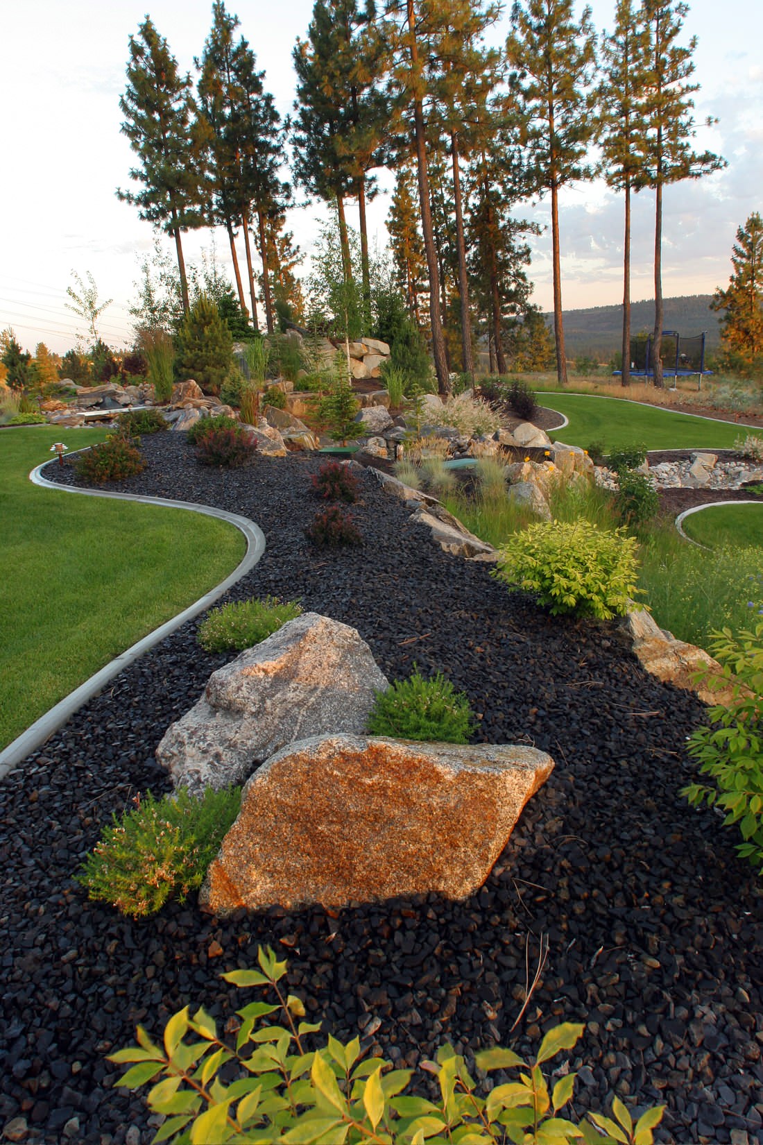 Transform Your Landscape with Black Decorative Rock Landscaping