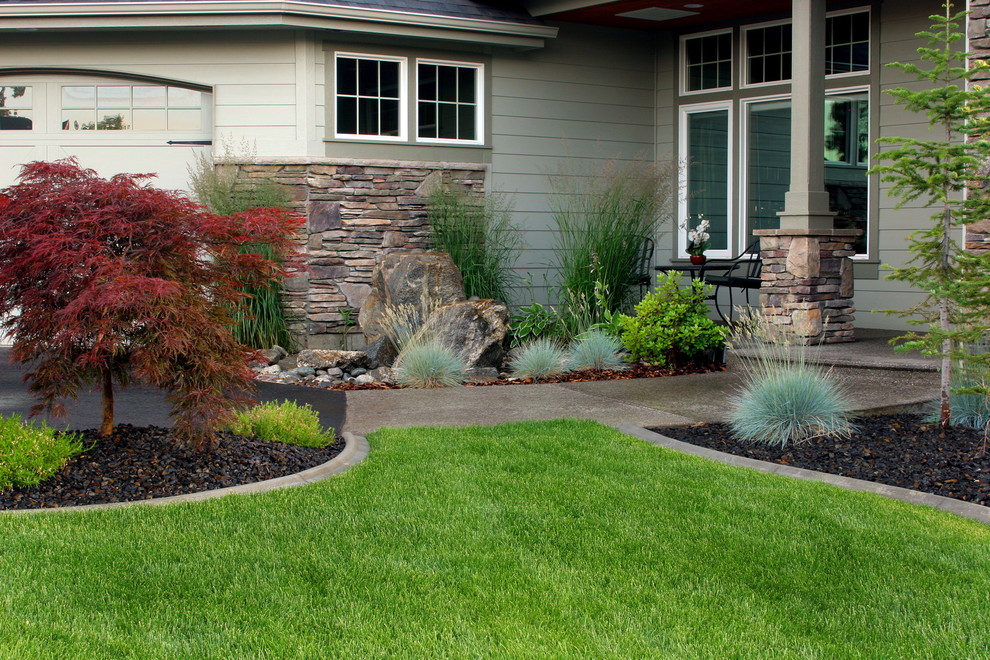 Design ideas for a large contemporary backyard formal garden in Seattle.