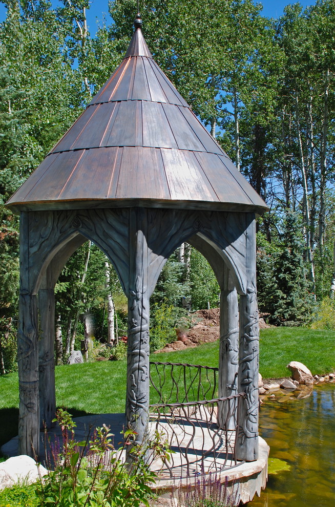 Inspiration for a classic garden in Salt Lake City with a water feature.