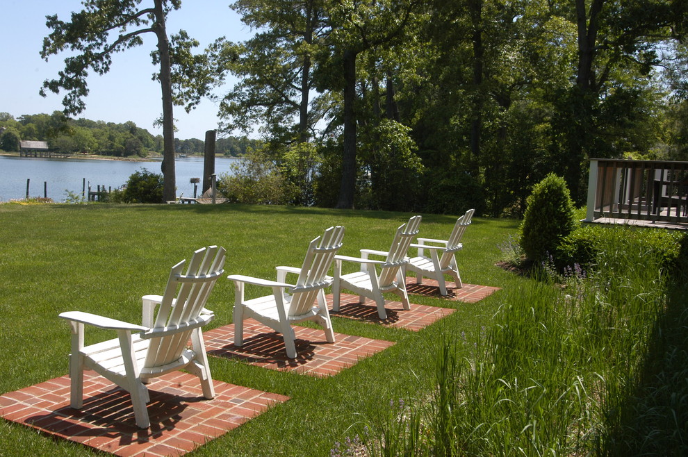 Inspiration for a large coastal full sun backyard brick landscaping in DC Metro for summer.