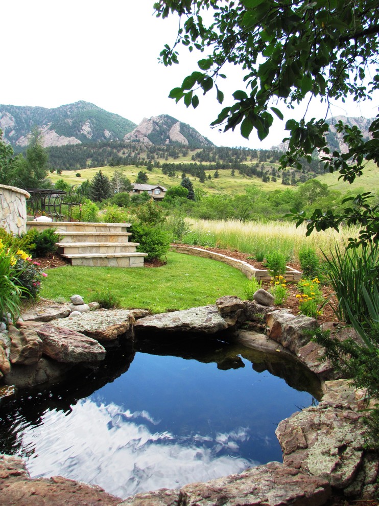 Design ideas for a classic garden in Denver with a water feature.