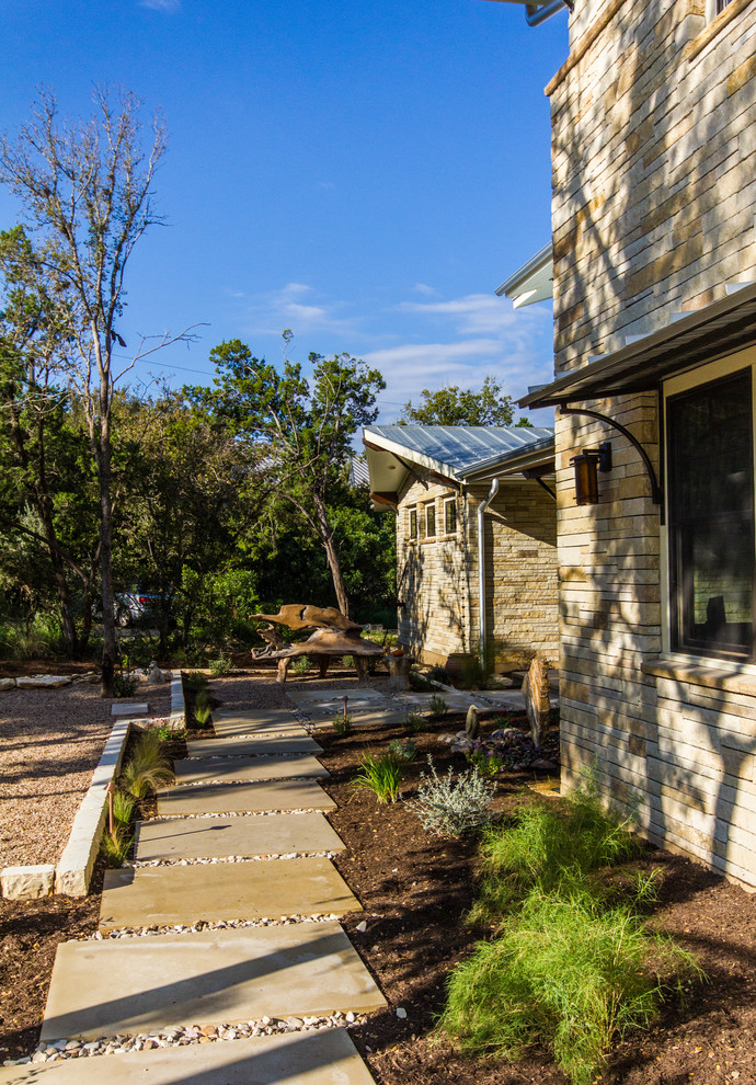 This is an example of a large craftsman landscaping in Austin.