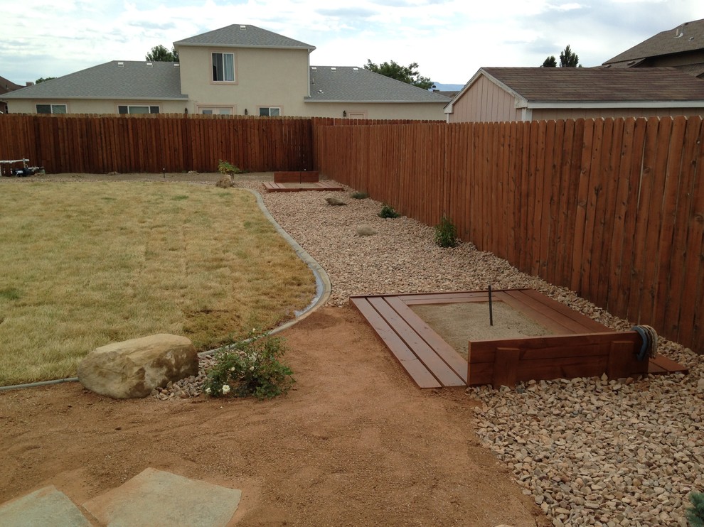 Design ideas for a mid-sized contemporary backyard landscaping in Denver.