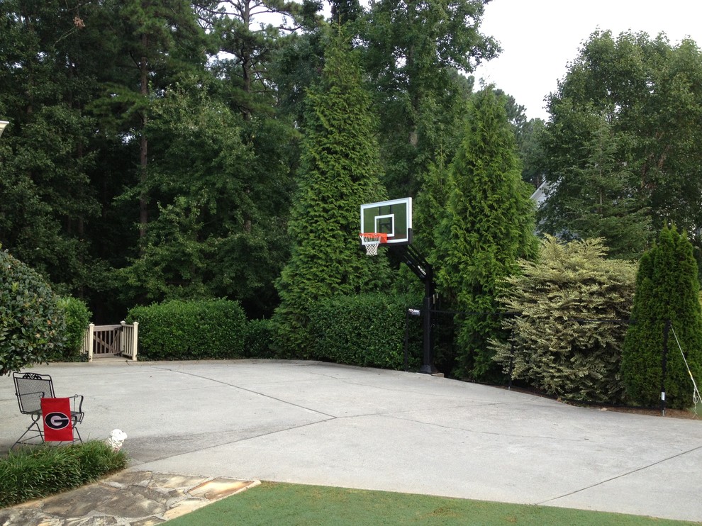 Inspiration for a large traditional partial sun front yard outdoor sport court in Atlanta.