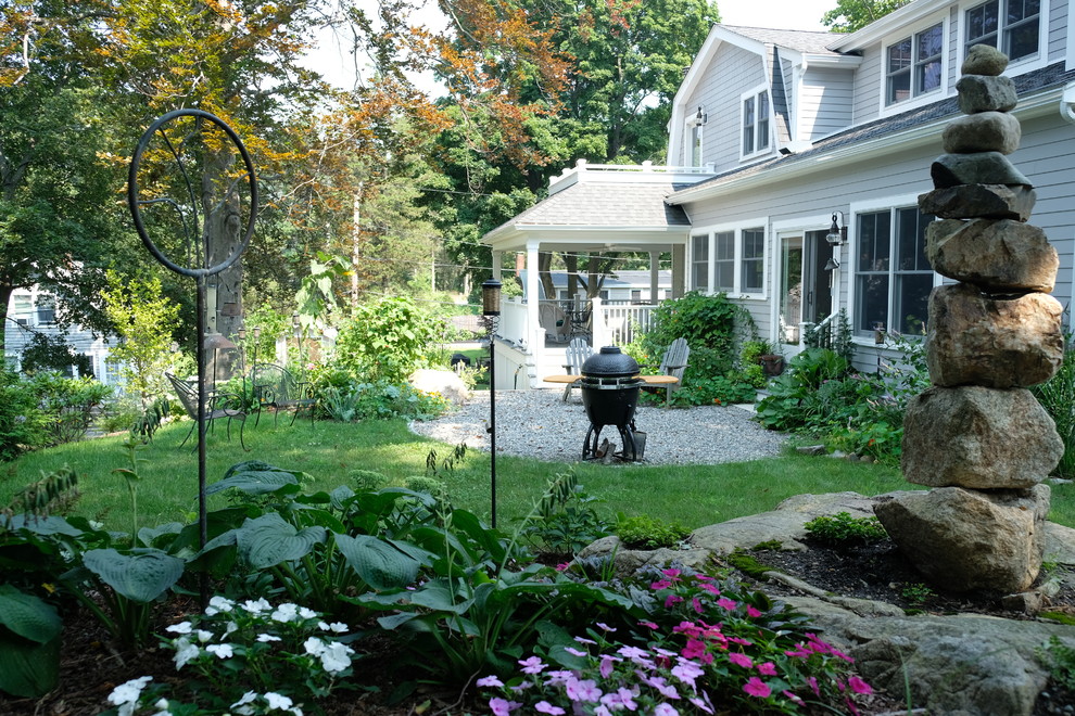 Inspiration for a small contemporary back xeriscape partial sun garden for summer in Boston.