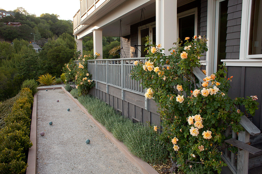Photo of a classic full sun garden in San Francisco with an outdoor sport court and gravel.