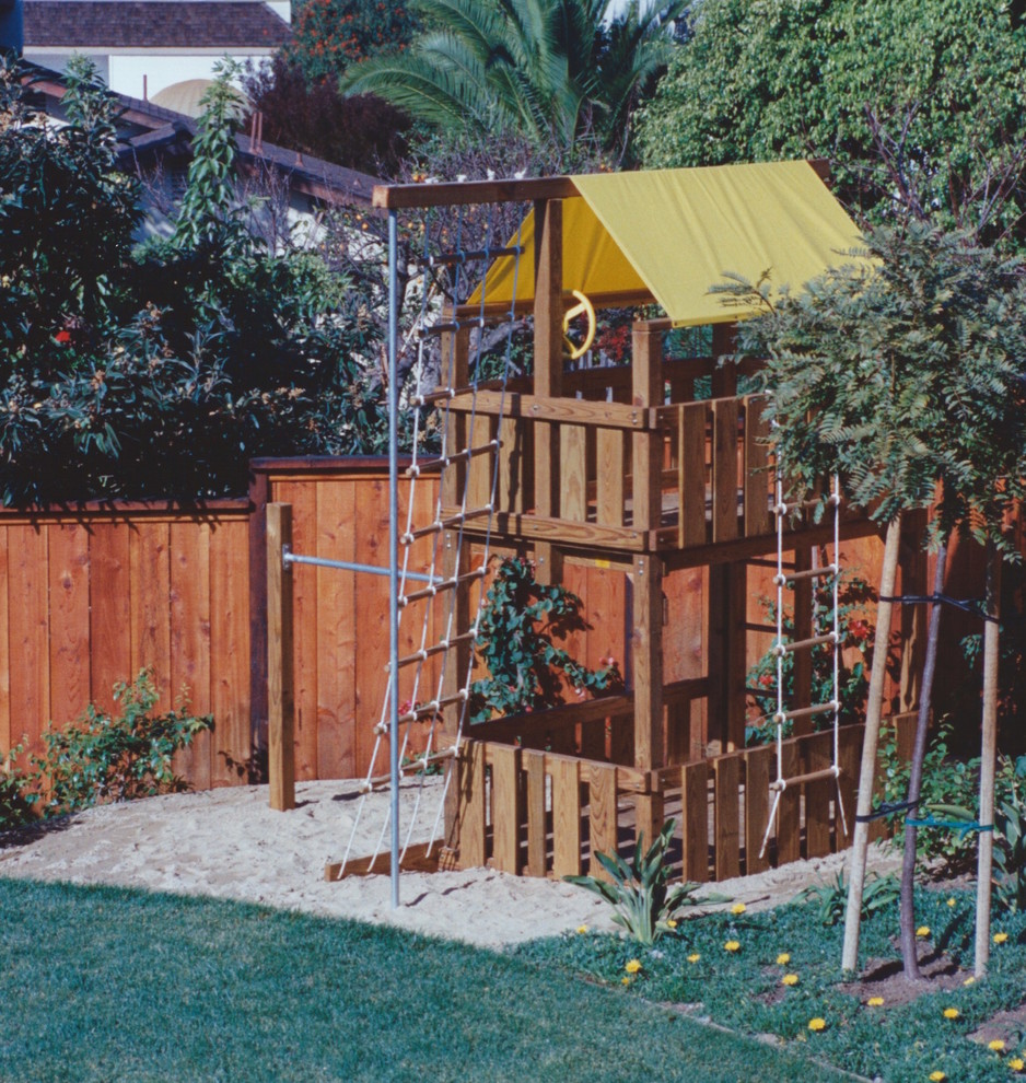 Inspiration for a traditional full sun backyard landscaping in San Diego.
