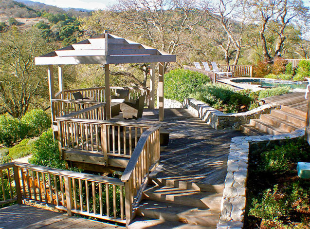 Photo of an expansive rustic back xeriscape full sun garden for summer in San Francisco with a garden path and decking.