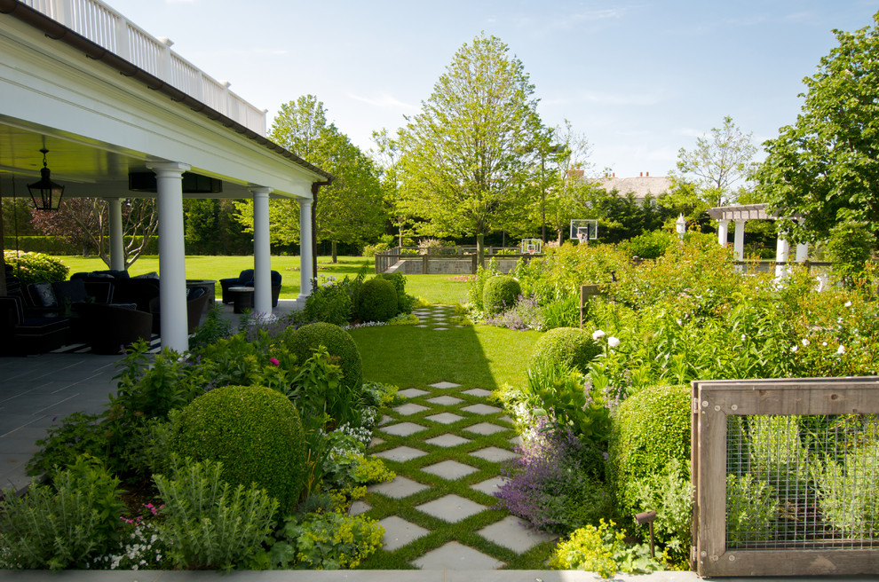 Design ideas for a traditional backyard formal garden in New York.
