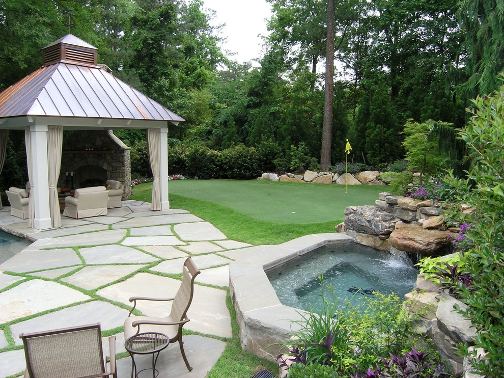 Design ideas for a traditional garden in Atlanta with a water feature.