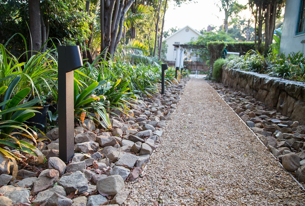 Photo of a large southwestern partial sun side yard gravel garden path in Santa Barbara for summer.