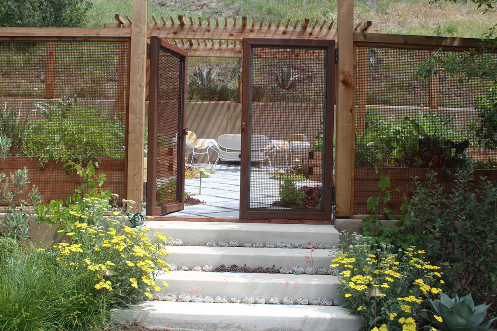 Design ideas for a rural back full sun garden for summer in San Diego with a garden path.