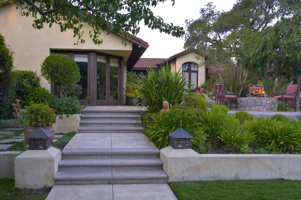 This is an example of a mediterranean hillside landscaping in San Francisco with a fire pit.