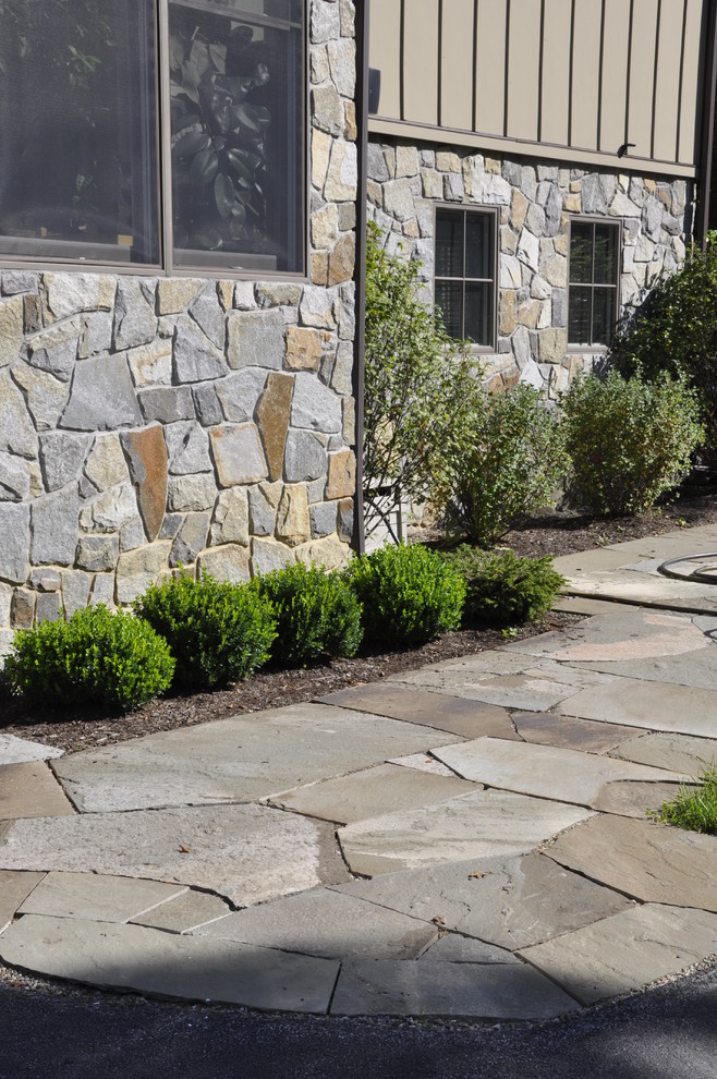 Design ideas for a medium sized rustic side partial sun garden in New York with natural stone paving.