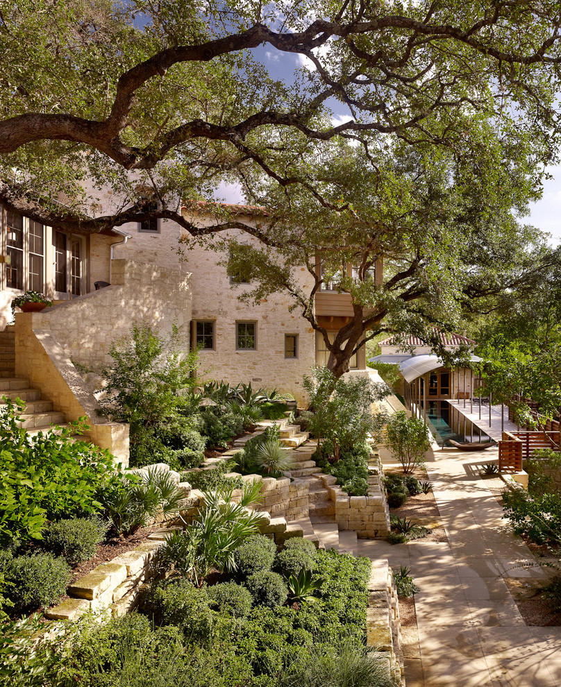 Inspiration for a mediterranean courtyard landscaping in Austin.