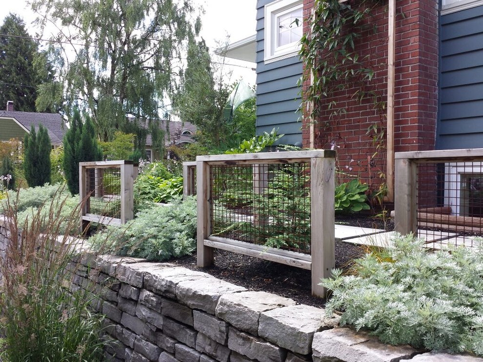 Idee per un giardino american style esposto in pieno sole di medie dimensioni e nel cortile laterale con pacciame