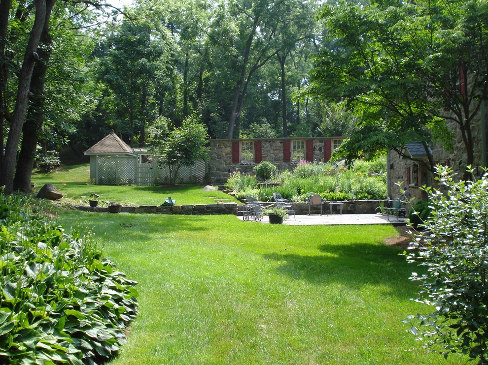 Photo of a traditional back fully shaded garden wall in Baltimore.