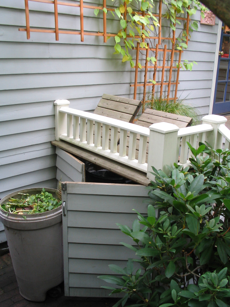 Design ideas for a small eclectic shade backyard landscaping in Seattle with decking for summer.