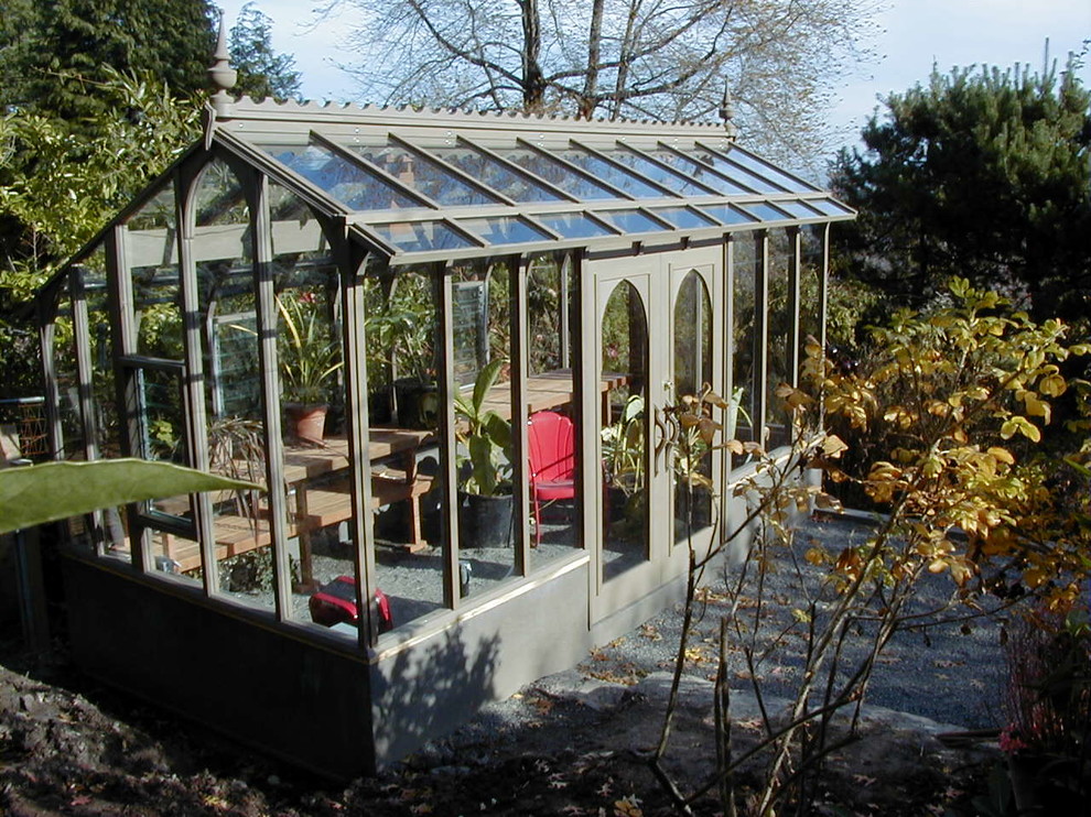 Inspiration for a traditional back partial sun garden in Portland.