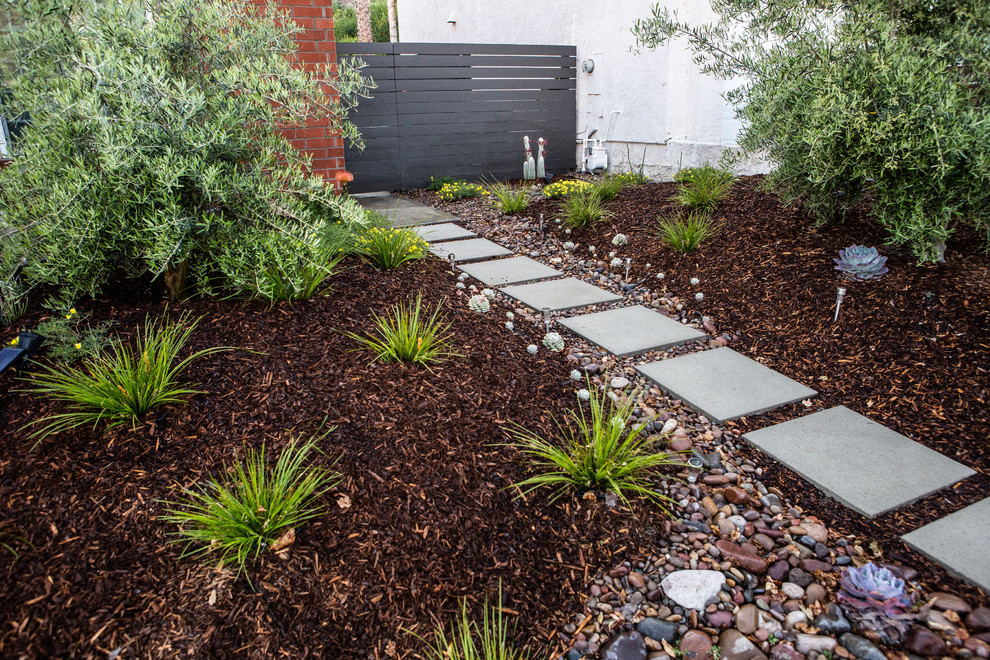 Design ideas for a mid-sized modern drought-tolerant and full sun front yard concrete paver landscaping in San Diego.