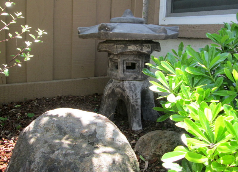 Inspiration for a small asian partial sun front yard stone landscaping in San Francisco for fall.