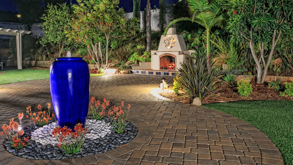 Photo of a large front yard concrete paver garden path in San Diego.