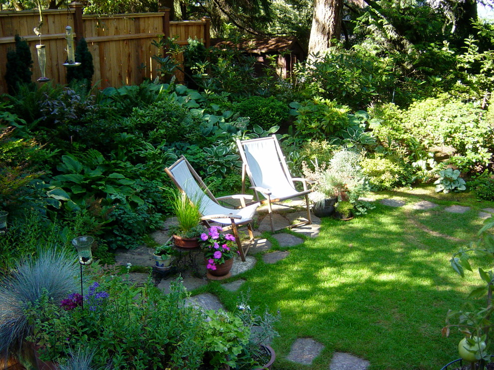 Photo of a small traditional shade backyard landscaping in Portland.