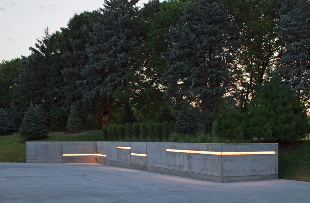 Photo of a huge contemporary driveway in Omaha.