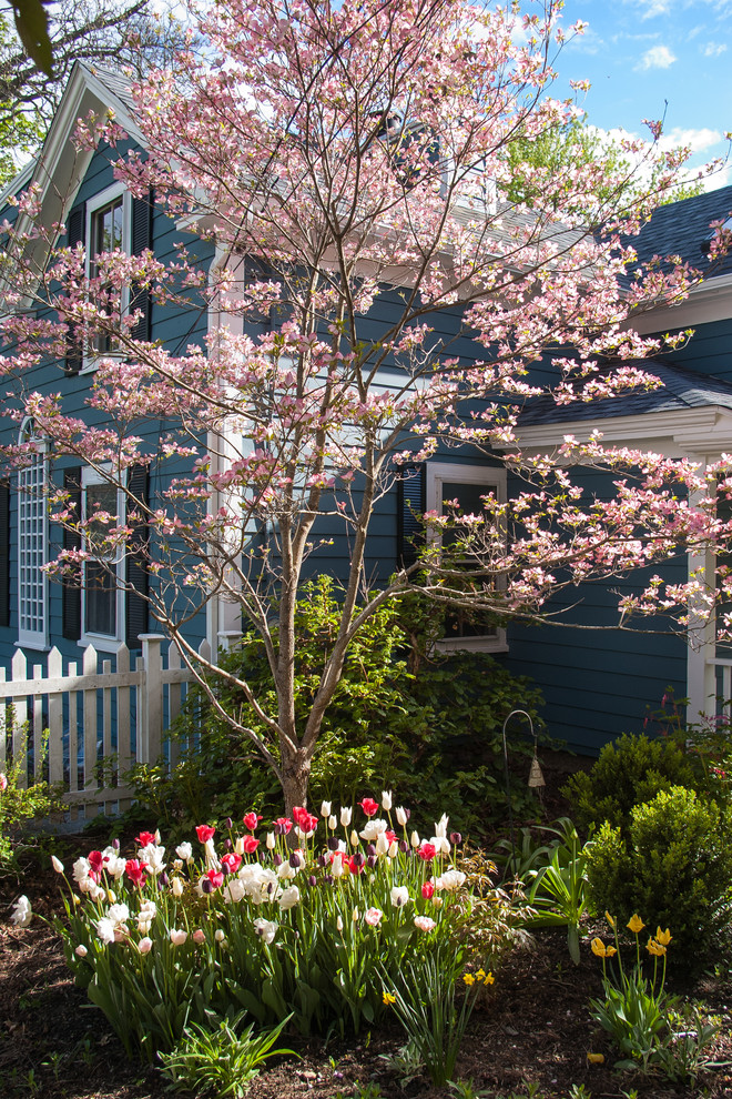 This is an example of a small classic front partial sun garden for spring in Boston.