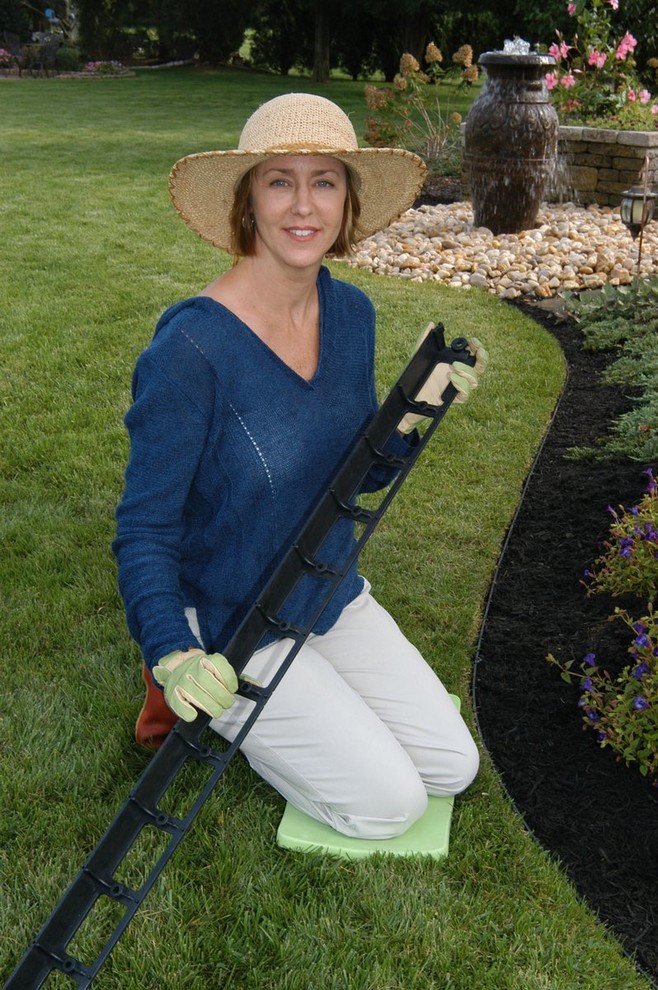 This is an example of a traditional backyard mulch landscaping in Detroit for spring.