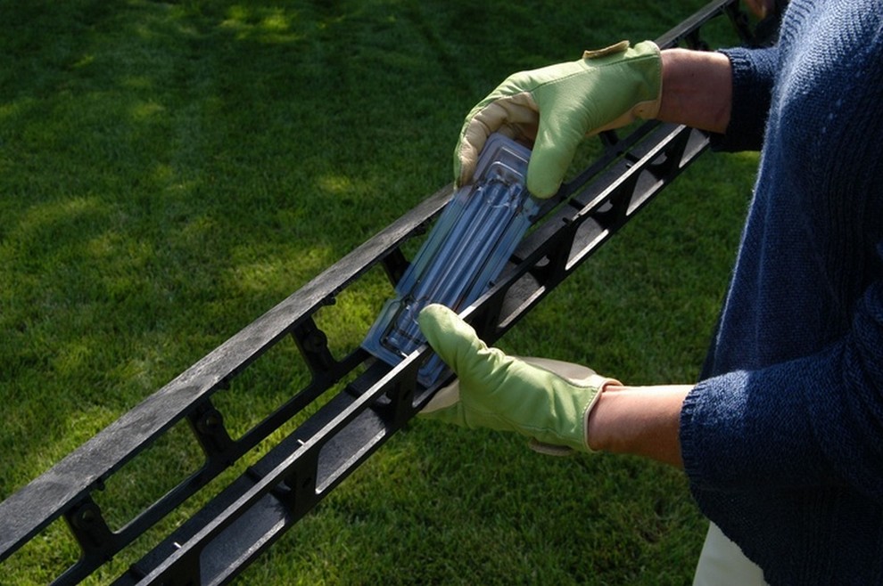 Design ideas for a traditional backyard concrete paver landscaping in Detroit for spring.