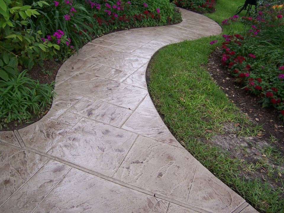 Photo of a medium sized classic back garden in Houston with a garden path and concrete paving.