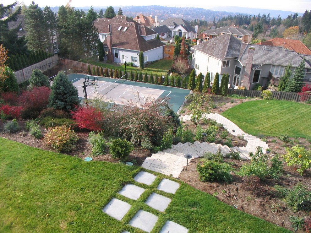 Contemporary garden in Seattle with an outdoor sport court.