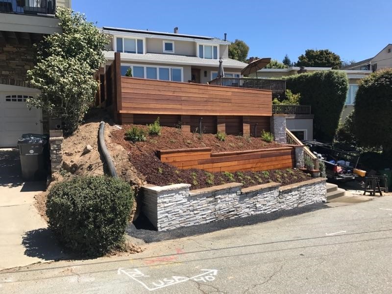 Stone and Cedar Retaining Wall Terraces Contemporary Landscape