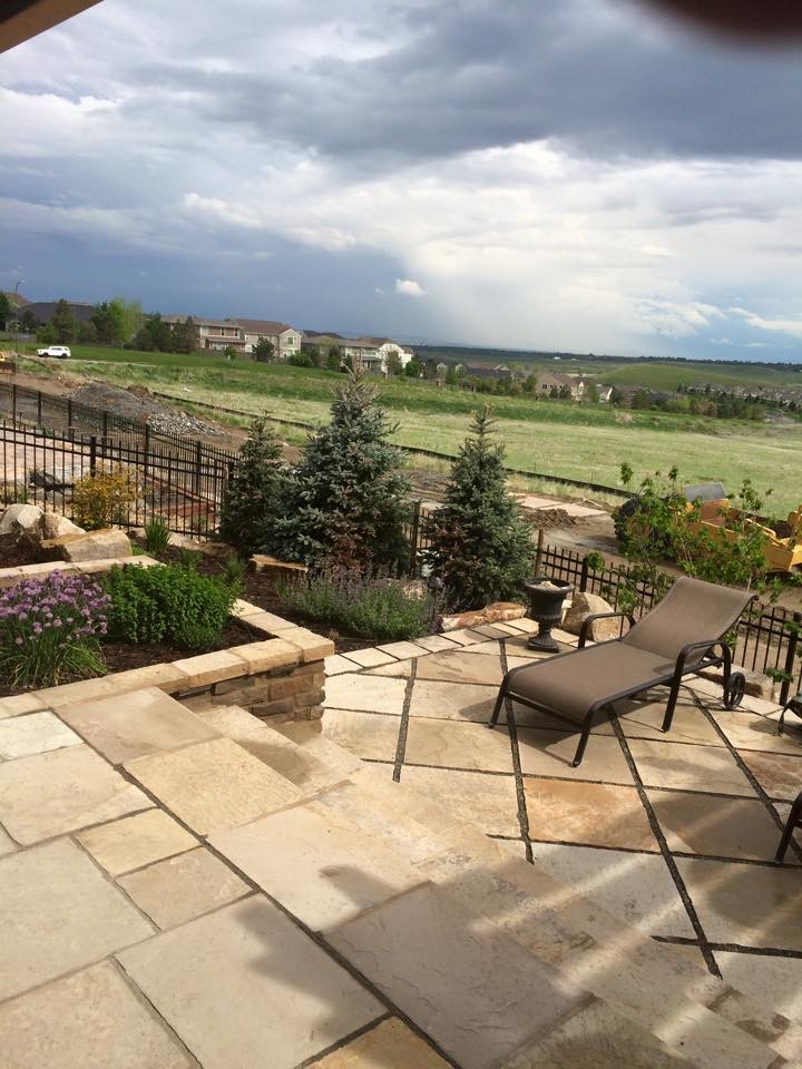 Stone Patio on a Slope Contemporary Landscape Denver by C&H