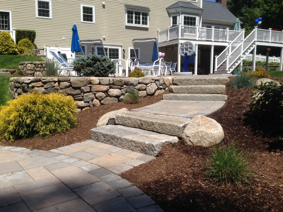This is an example of a traditional backyard landscaping in Boston.