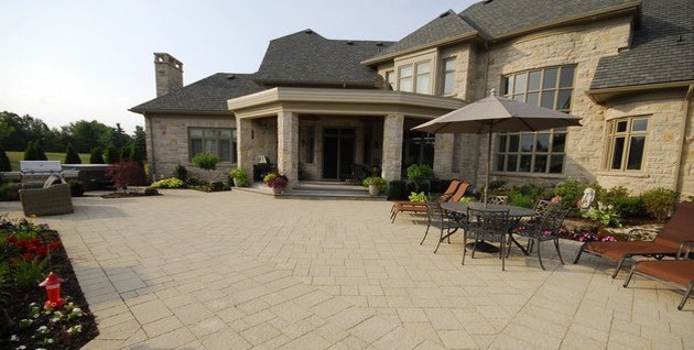 This is an example of a large transitional backyard landscaping in Toronto.
