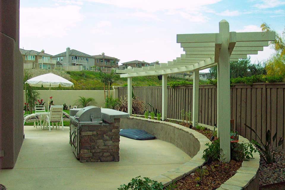 This is an example of a mid-sized traditional partial sun side yard water fountain landscape in San Diego for spring.