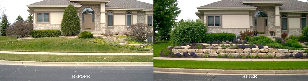 Design ideas for a mid-sized tropical front yard landscaping in Milwaukee.