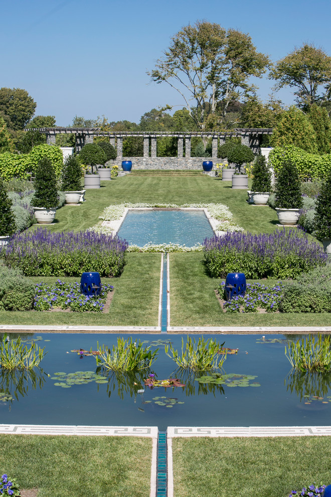 This is an example of a huge traditional formal garden in Boston for summer.