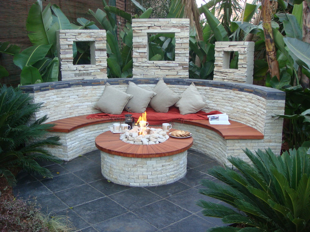 Island style patio photo in Other