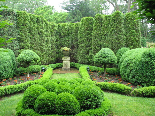Photo of a mediterranean side yard landscaping in New York.