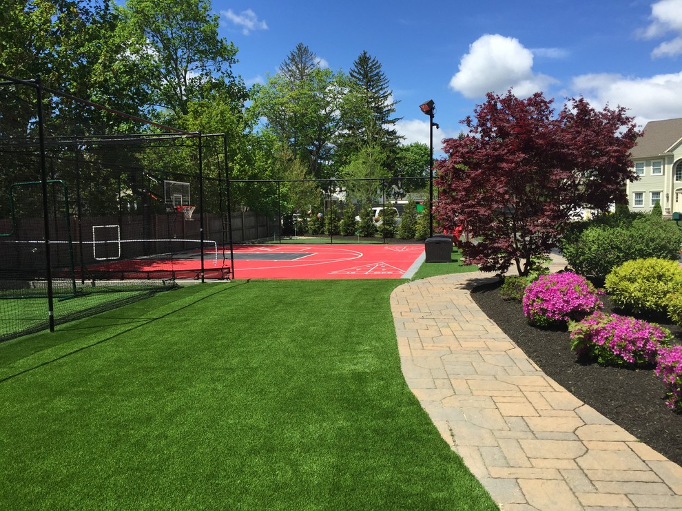 Photo of a large traditional back garden in Boston with an outdoor sport court.