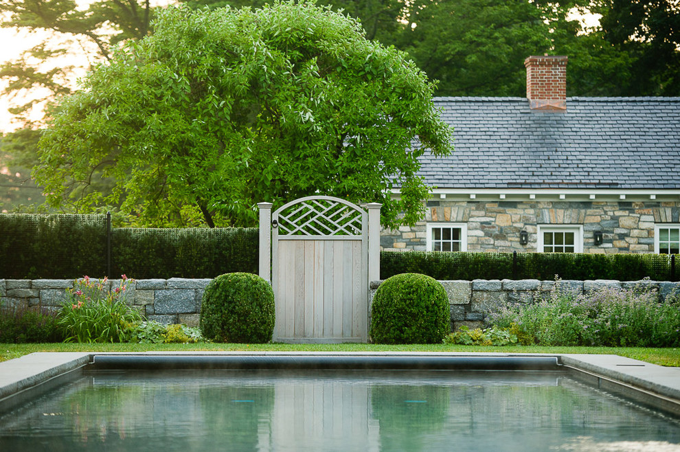 Inspiration for a traditional backyard landscaping in New York.